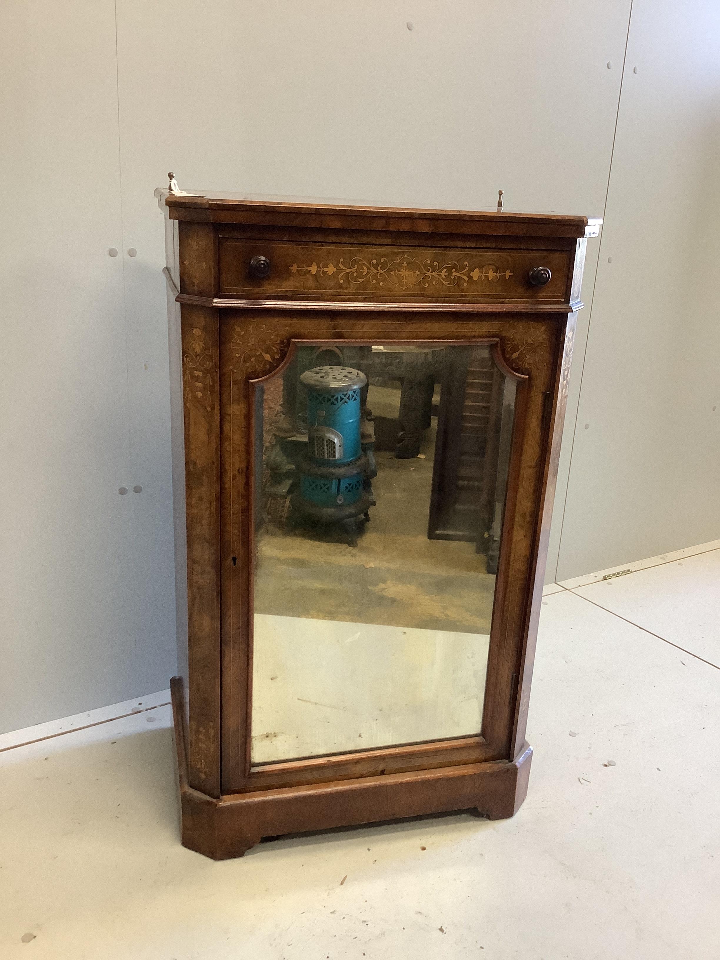 A late Victorian marquetry inlaid amboyna banded figured walnut music cabinet, width 61cm, depth 38cm, height 99cm